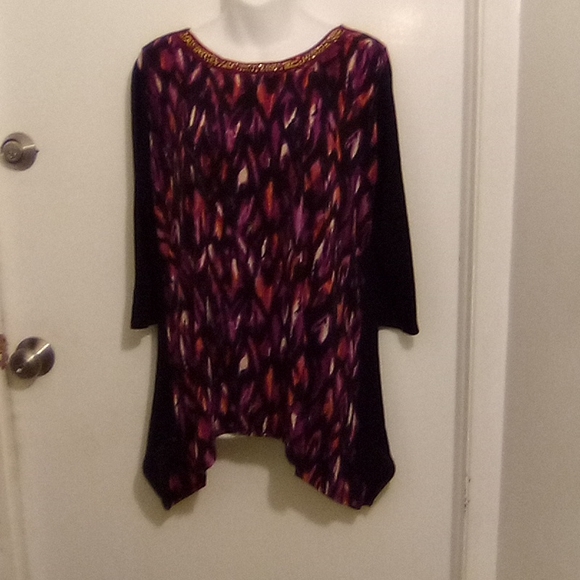 Asymmetrical Top With Accent Beads and Shark Bite Hem - Picture 4 of 10